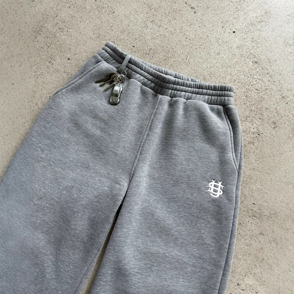Pantalon de jogging uni zippé