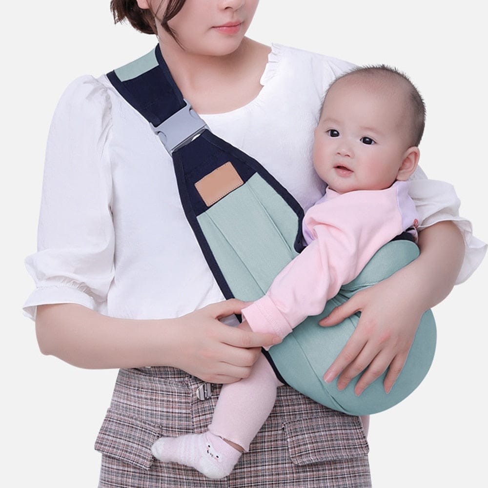 Babytrage als Schulterschlinge