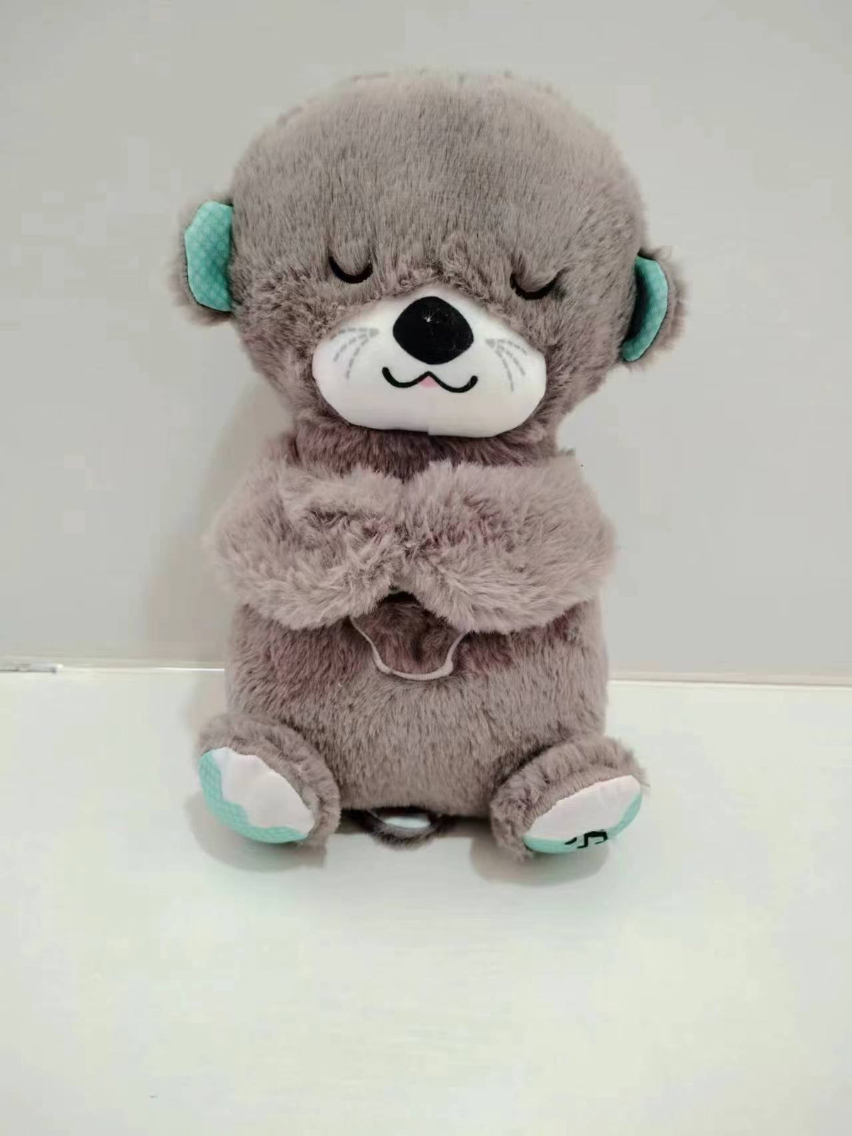 Soundmaschine Soothe 'n Snuggle Otter Tragbares Plüsch-Babyspielzeug mit sensorischen Details, Musik, Lichtern und rhythmischen Atembewegungen