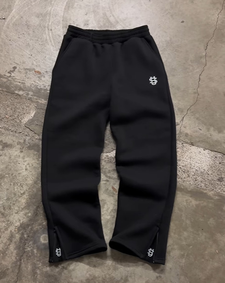 Pantalon de jogging uni zippé