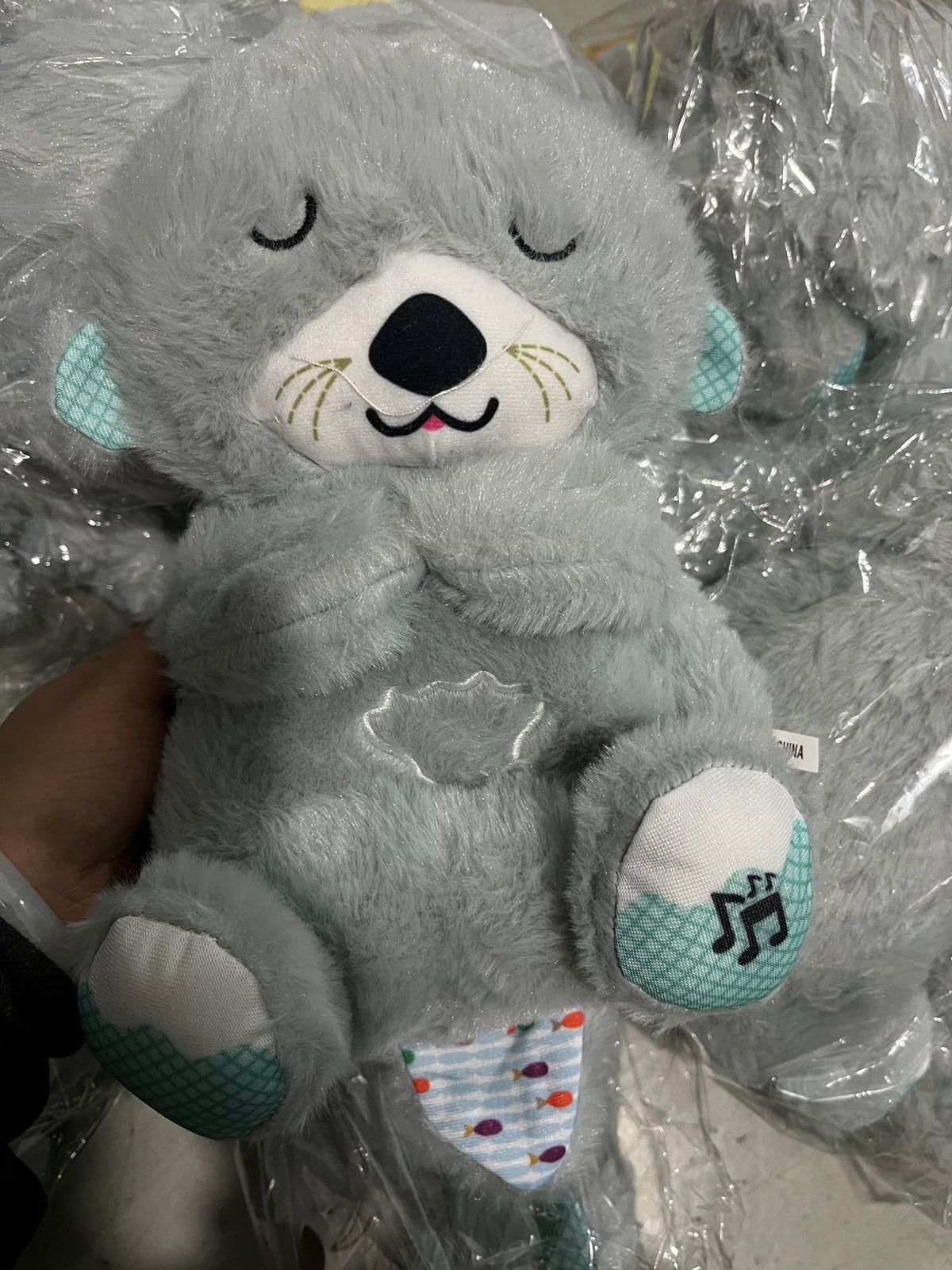 Soundmaschine Soothe 'n Snuggle Otter Tragbares Plüsch-Babyspielzeug mit sensorischen Details, Musik, Lichtern und rhythmischen Atembewegungen