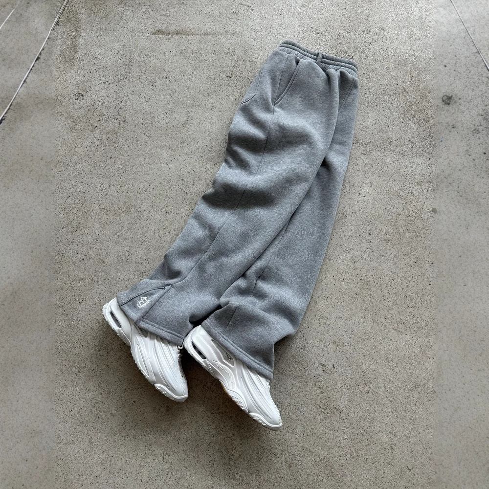 Pantalon de jogging uni zippé