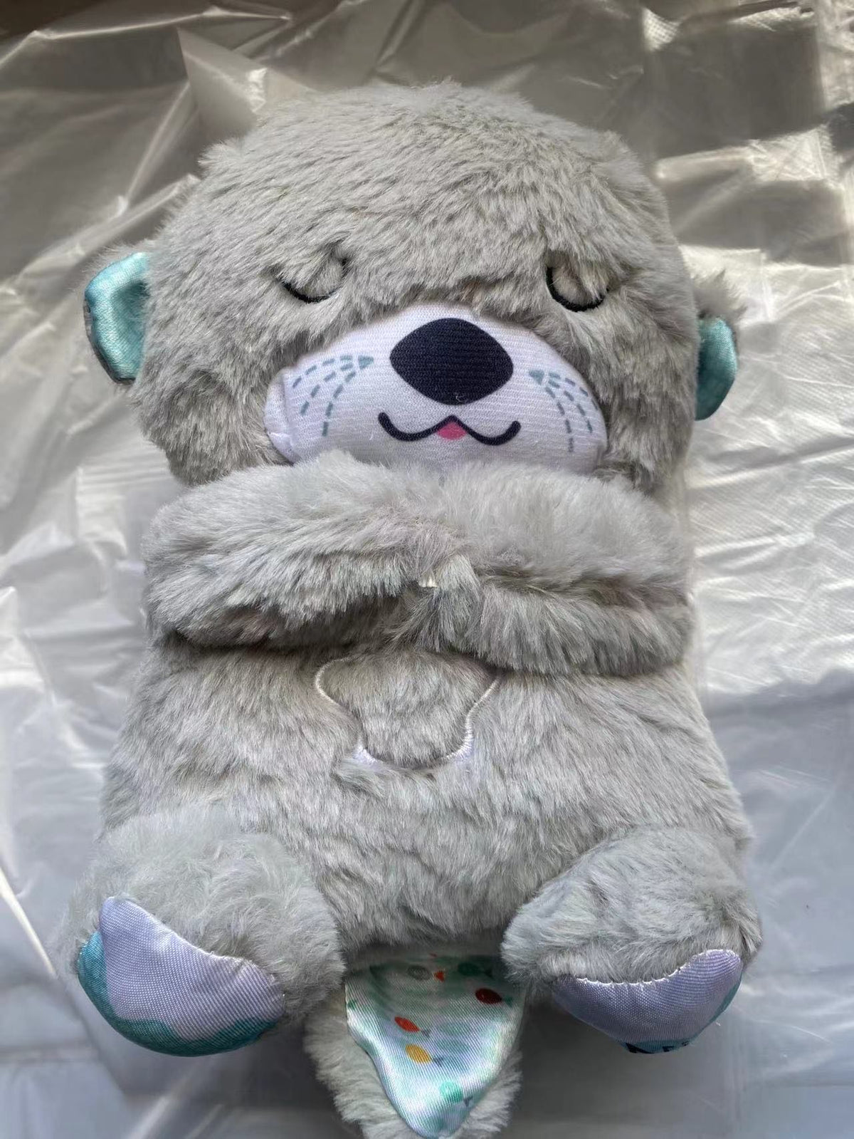 Soundmaschine Soothe 'n Snuggle Otter Tragbares Plüsch-Babyspielzeug mit sensorischen Details, Musik, Lichtern und rhythmischen Atembewegungen